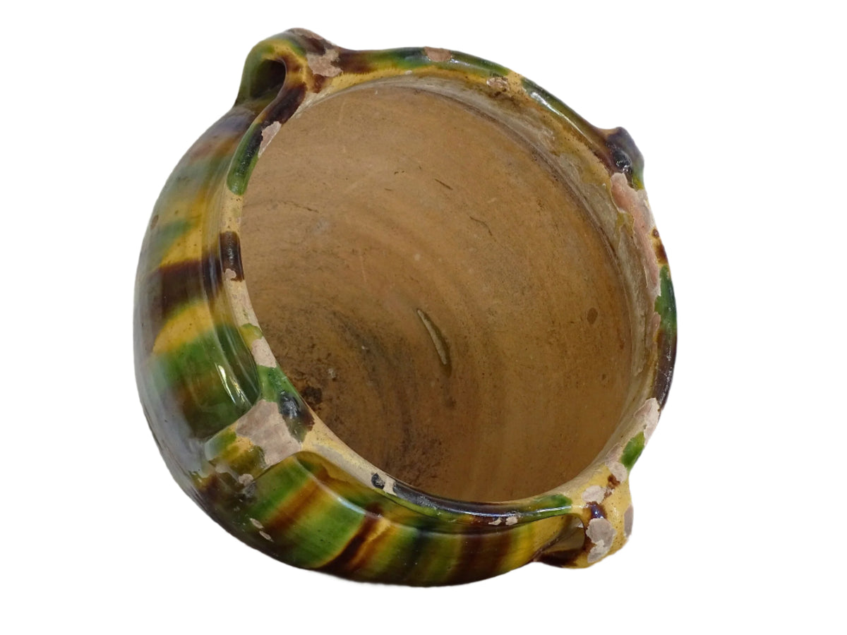 French antique terracotta planter with a stripe drip glaze in yellow, green and brown . Pottery planter from Castelnaudary. Antique ceramic jardinière or ceramic cachepot.