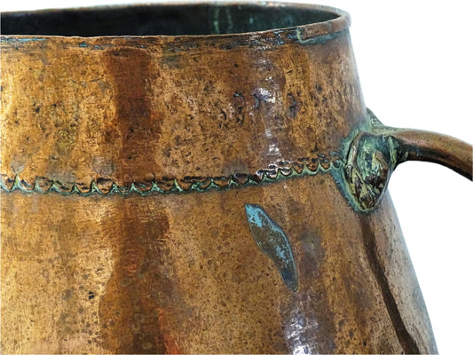 Tapered French antique copper vessel twin handles and a rounded base. Antique copper pot for French countryside decor.