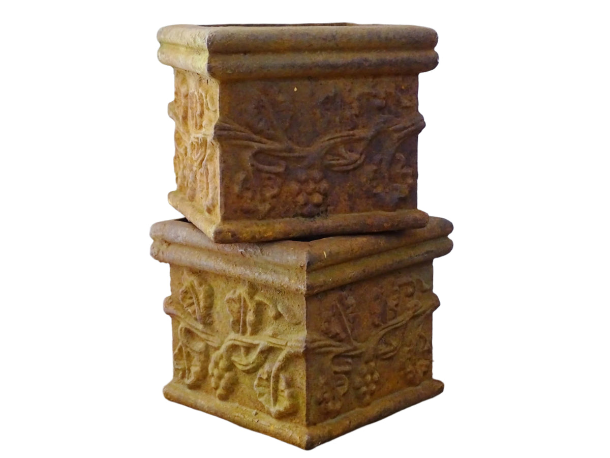 Pair of French antique cast iron planters. Square plant pots with grape and vine decoration. Indoor or outdoor decor.
