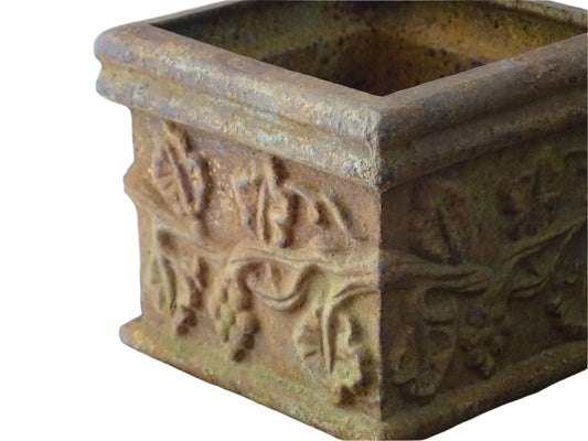 Pair of French antique cast iron planters. Square plant pots with grape and vine decoration. Indoor or outdoor decor.