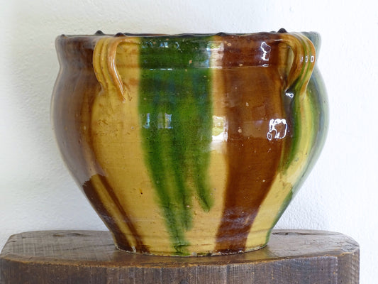 French antique ceramic planter from Castelnaudary, this antique cache pot is in glazed terracotta with green, yellow and brown.