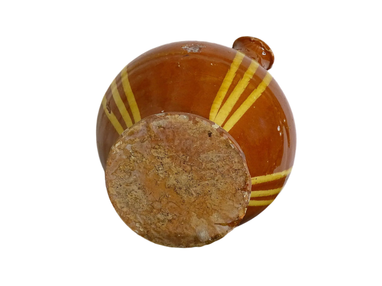 Rustic French antique pottery cruche or gargoulette with a red brown glaze and yellow stripes. Antique terracotta pitcher with a rounded shape with a handle to the top and two spouts. Provencal style farmhouse table decor.