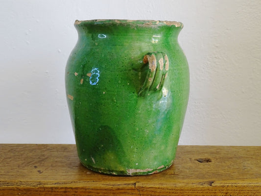 French antique confit pot with green glaze and yellow glazed interior. Green confit pot with two handles