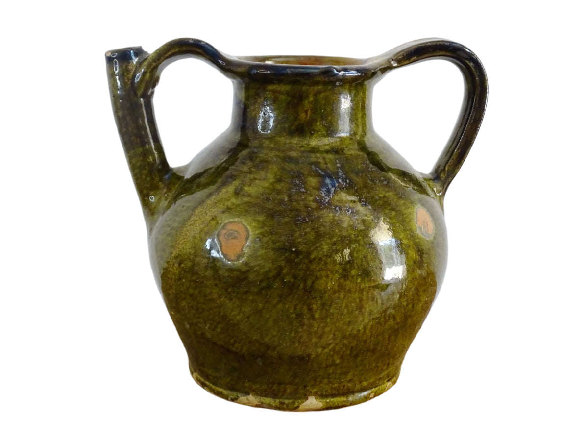 French antique cruche or orjol with an earthy green glaze. Antique terracotta water jug from the Languedoc with a timeworn appearance. French farmhouse aesthetic.