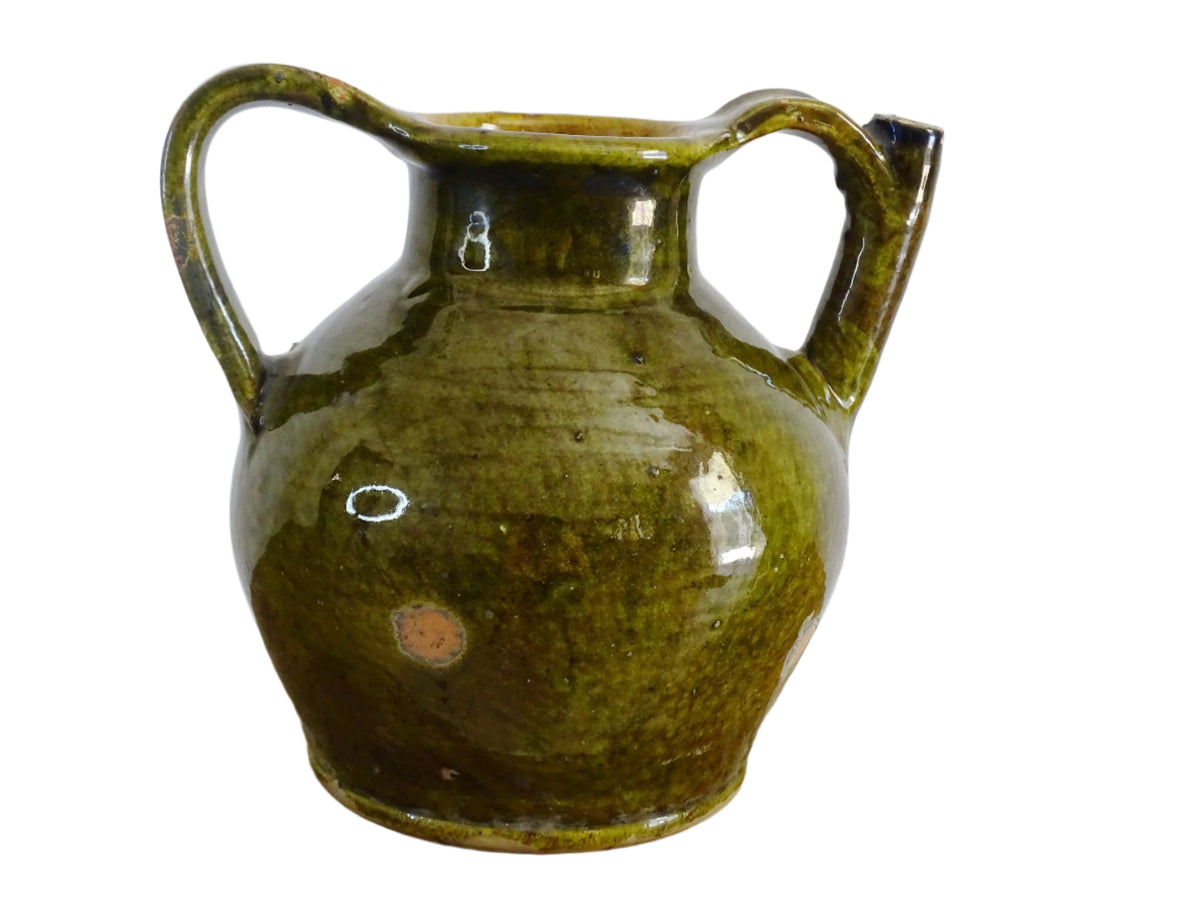 French antique cruche or orjol with an earthy green glaze. Antique terracotta water jug from the Languedoc with a timeworn appearance. French farmhouse aesthetic.