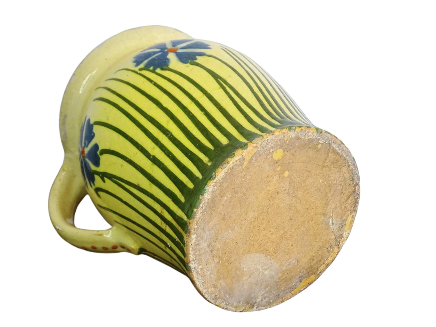 French antique pottery jug with hand painted flowers. Yellow glazed pitcher with blue flowers for a French farmhouse or cottagecore kitchen.