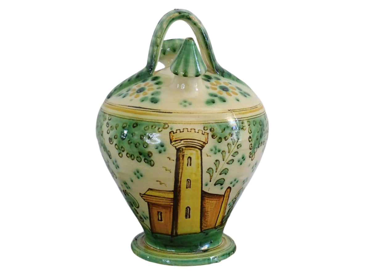 Decorated Spanish vintage gargoulette with a green and ochre yellow glaze. Puente Del Arzobispo pottery water pitcher is hand-painted with trees, a castle and flowers. It has a handle to the top, as well as two spouts. Ceramic pitcher or glazed terracotta jug.