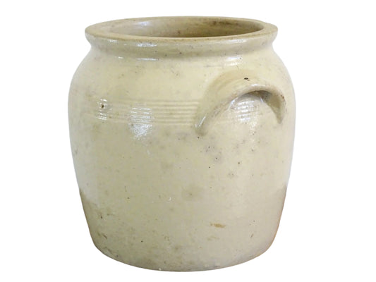 French antique stoneware confit jar with a beige glaze. Pottery cache pot for a farmhouse style decor. Ceramic utensils holder or planter.