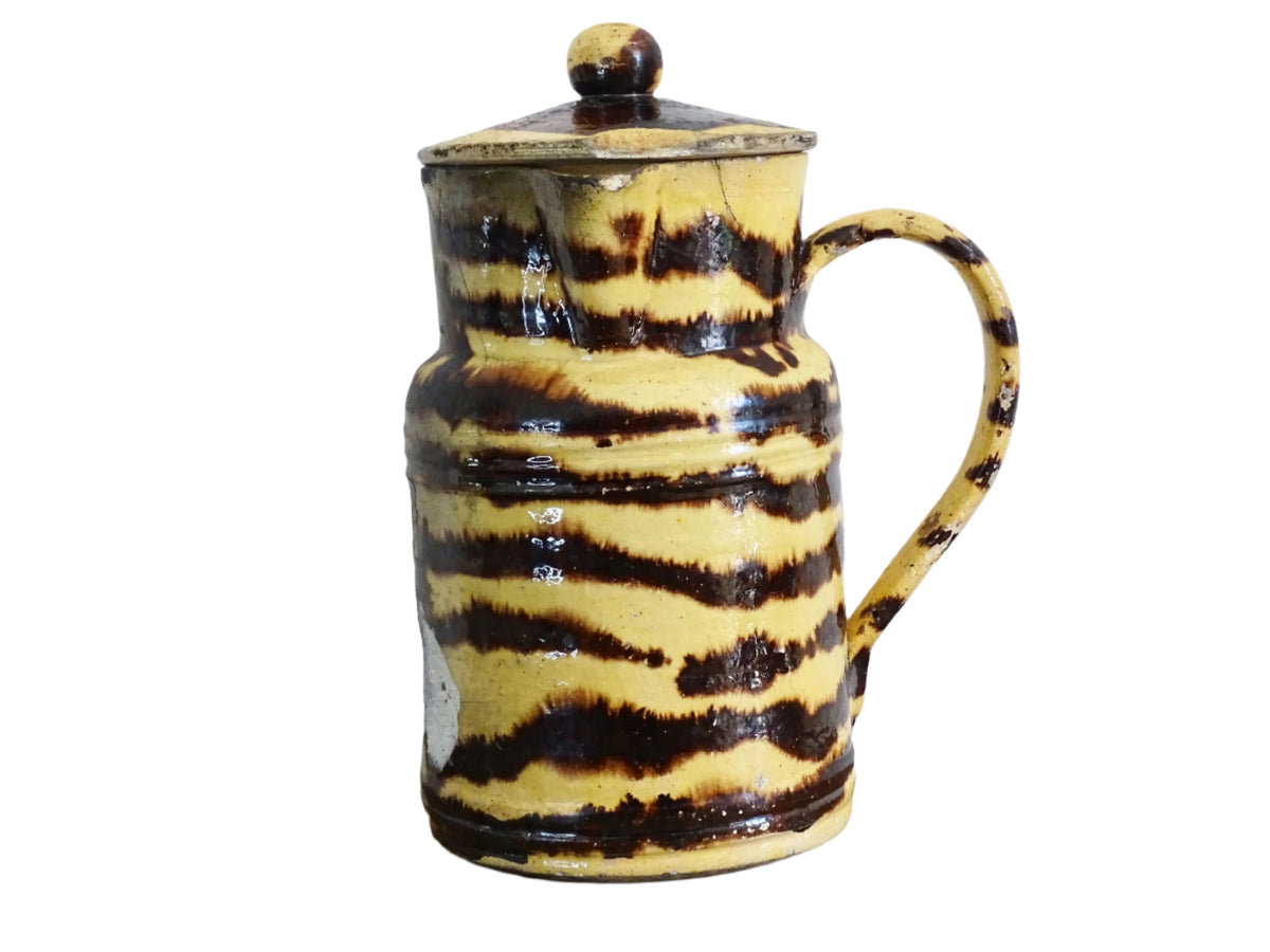 Large French antique pottery pitcher with a lid. Glazed ceramic pitcher with a brown drip glaze on a yellow glazed background. Dieulefit pottery pitcher or Savoie pottery jug.