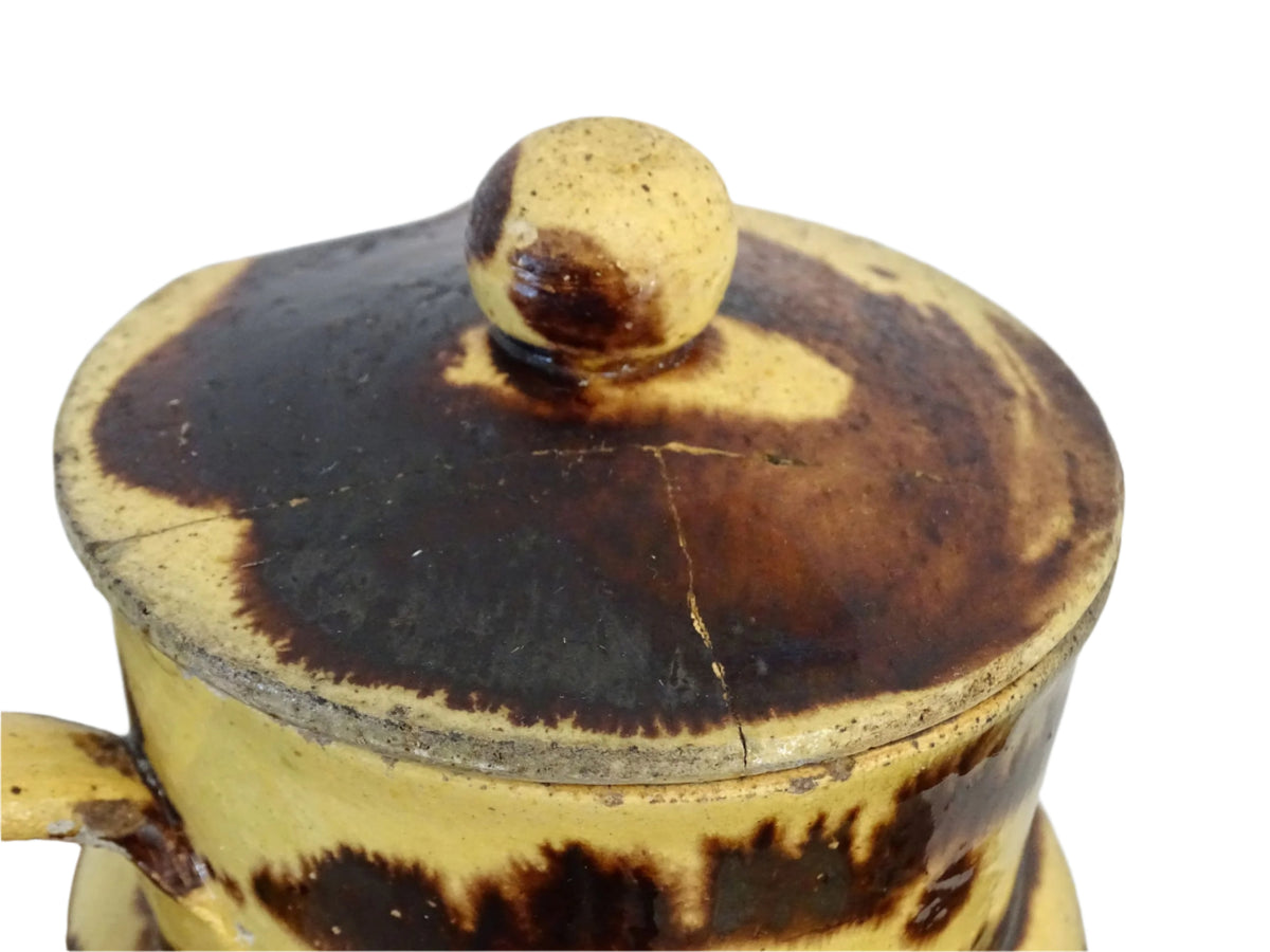 Large French antique pottery pitcher with a lid. Glazed ceramic pitcher with a brown drip glaze on a yellow glazed background. Dieulefit pottery pitcher or Savoie pottery jug.