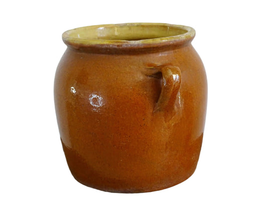 French antique confit pot with an orange glaze and yellow glaze exterior. Glazed terracotta pot with two handles. Antique ceramic jar for rustic farmhouse decor.