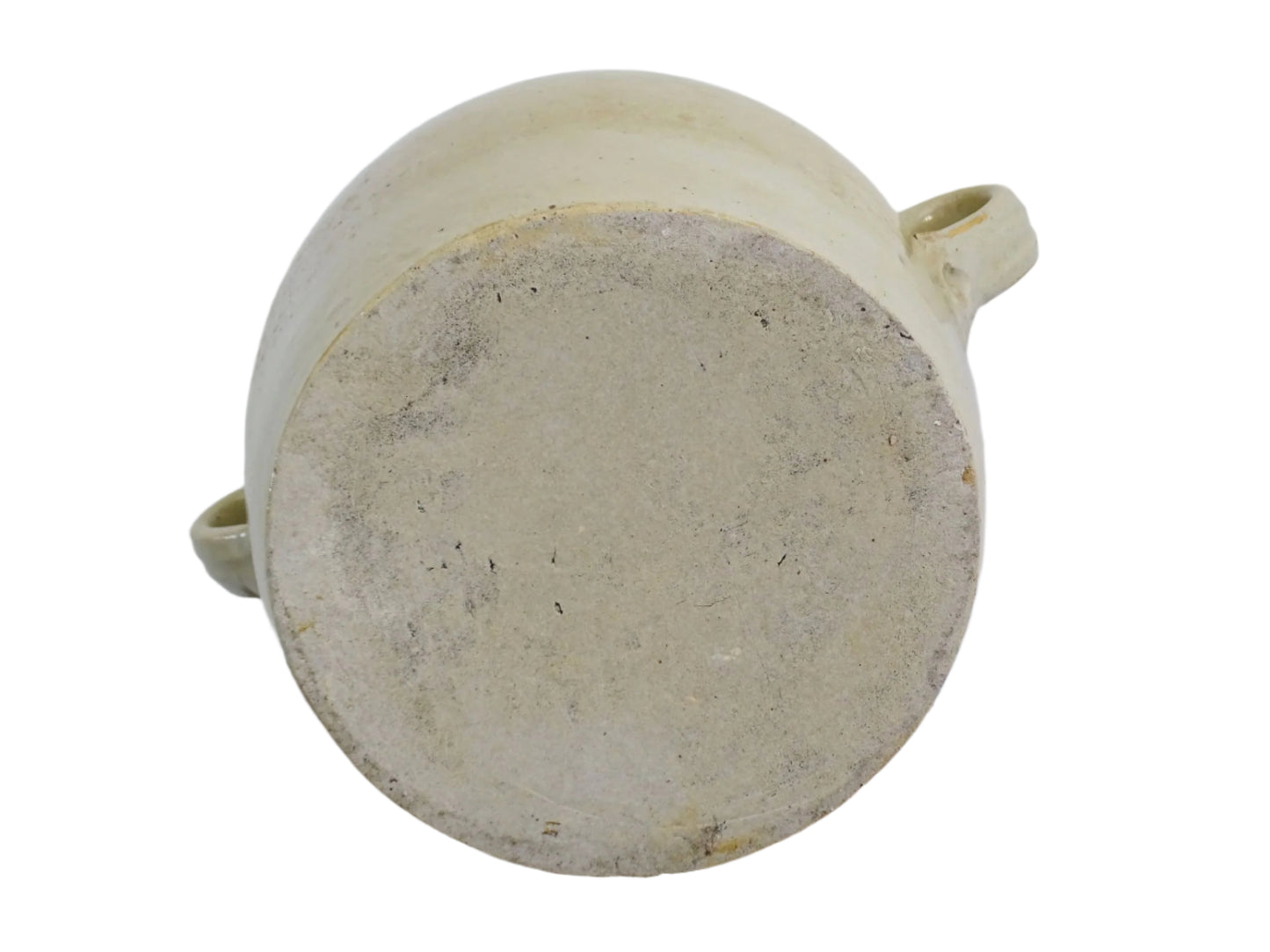 French antique stoneware confit pot with beige glaze. Confit jar with two handles. Rustic farmhouse pottery pot or ceramic utensil holder.
