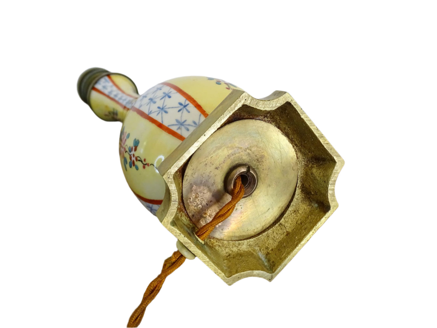 French vintage porcelain lamp base on a brass base. Ceramic table lamp with hand-painted in a Chinoiserie style, with floral motifs and geometric patterns on a yellow background. Ceramic vase lamp with slender, elongated form tapers to a flared top.