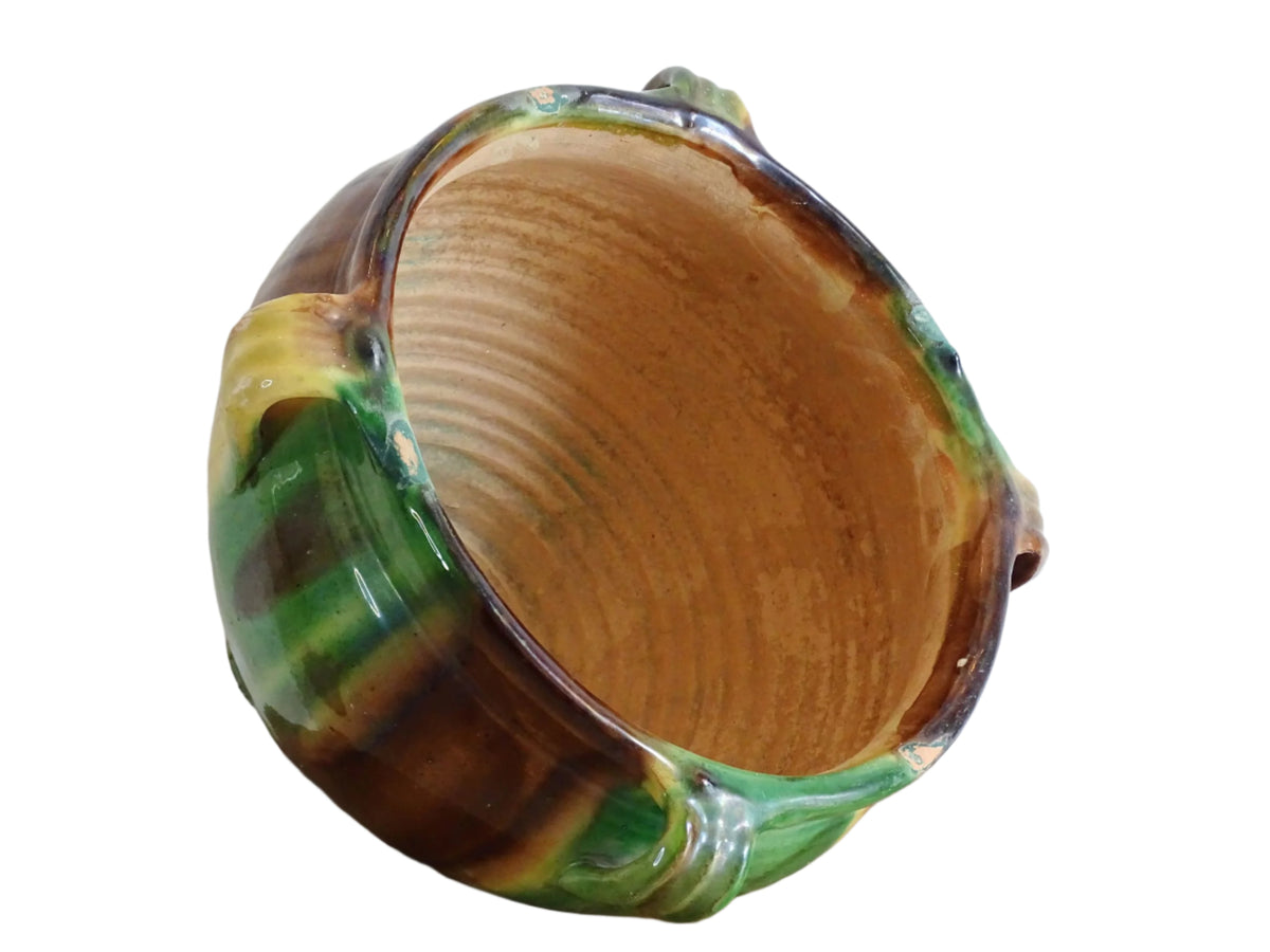 French antique ceramic planter from Castelnaudary. Pottery pot with a stripe drip glaze in yellow, green and brown. This antique cache pot in terracotta.