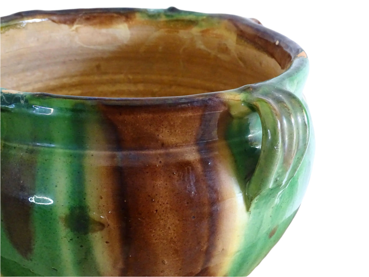 French antique ceramic planter from Castelnaudary. Pottery pot with a stripe drip glaze in yellow, green and brown. This antique cache pot in terracotta.