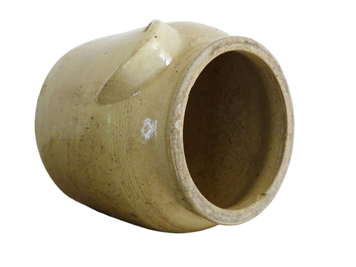 Rustic French antique stoneware confit jar. Glazed pottery cache pot is in a grey beige glaze for a French farmhouse style home.