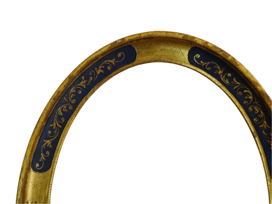 French antique oval gold picture frame with blue detailing. Crafted from wood and finished with a rich gilt.