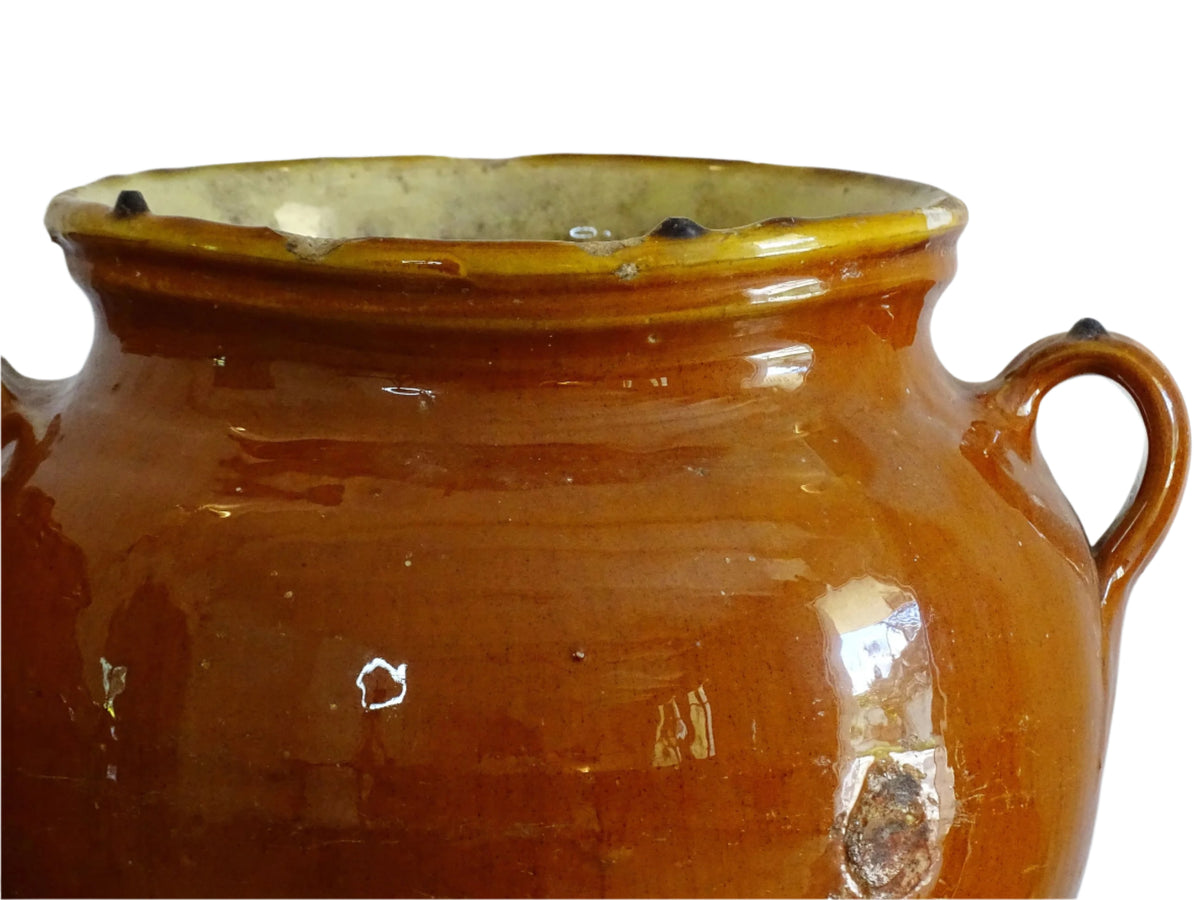 Pair of French antique confit pot vases with an orange glaze to the exterior and a yellow glaze to the interior for preserving food. Ceramic jars for rustic farmhouse decor. Orange and yellow glazed terracotta vases.