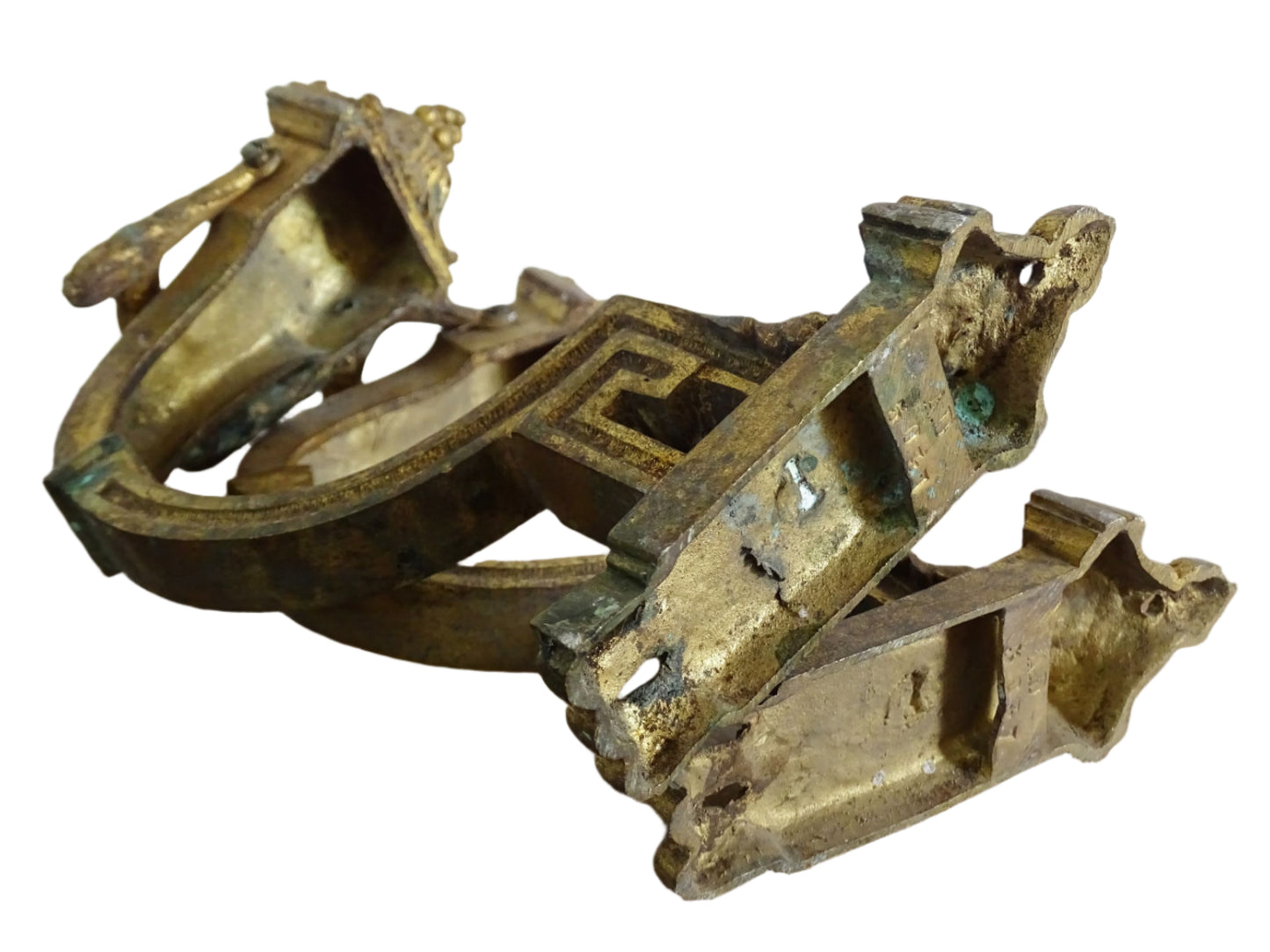 Pair of French antique curtain hooks in gilt bronze with intricate detailing. Empire style hooks with intricate acanthus leaf motifs and architectural elements.