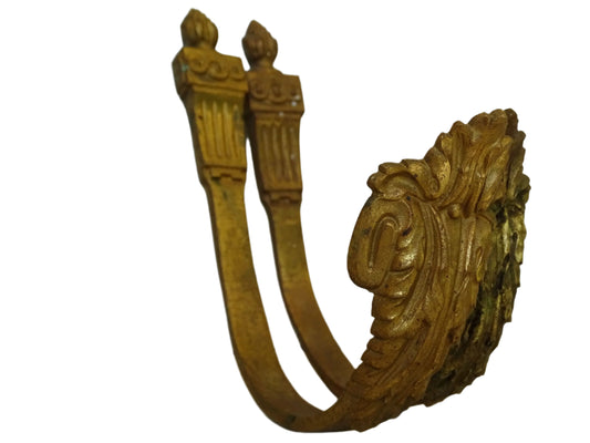 Pair of French antique curtain tie backs with acanthus leaves. Gilt bronze hooks with empire style backs.