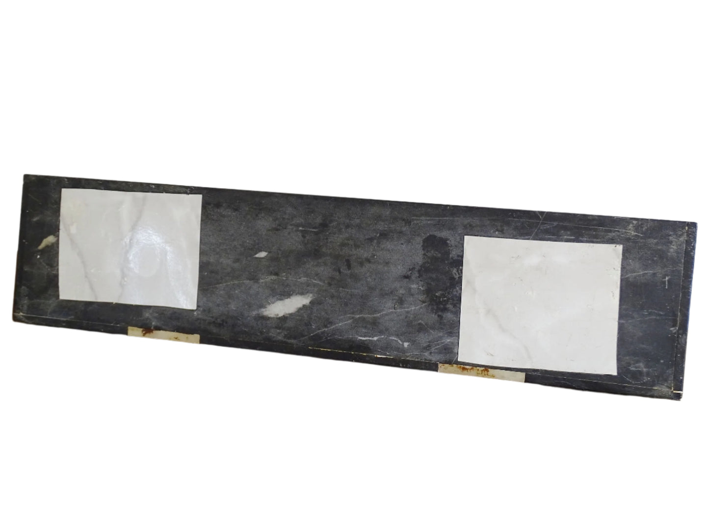 French Art Deco panther sculpture on a marble base. The black panther ornament has copper-painted highlights and is sculpted in a strong, prowling pose. It is mounted on a rectangular base of cream marble with black and white detailing.