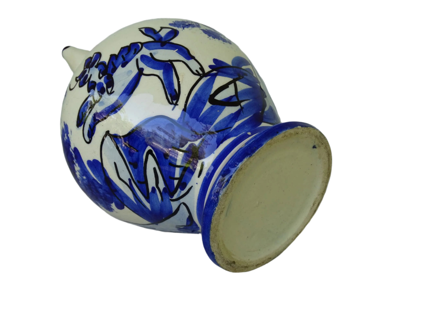 Spanish vintage blue and white ceramic gargoulette. This pottery water pitcher is hand-painted with trees and the figure of an animal. It has a handle to the top with faces to each side, as well as two spouts.