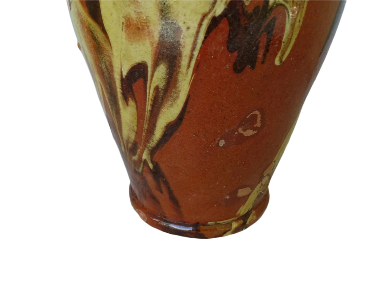 Rustic Catalan antique pottery gargoulette with a jaspé glaze in yellow or brown. The body of this marble glazed terracotta water jug has a sturdy handle to the top and two spouts.