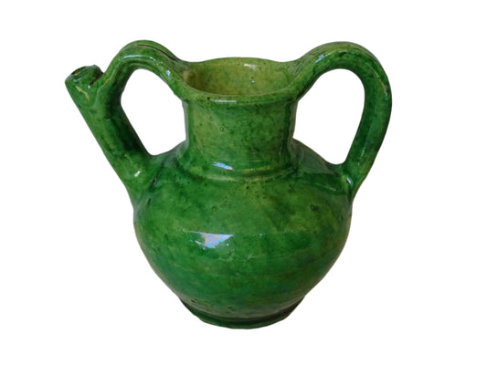 French antique green orjol or cruche in glazed terracotta. The green glaze of this pottery water jug has a pearlescent touch, with a yellow glaze to the interior.
