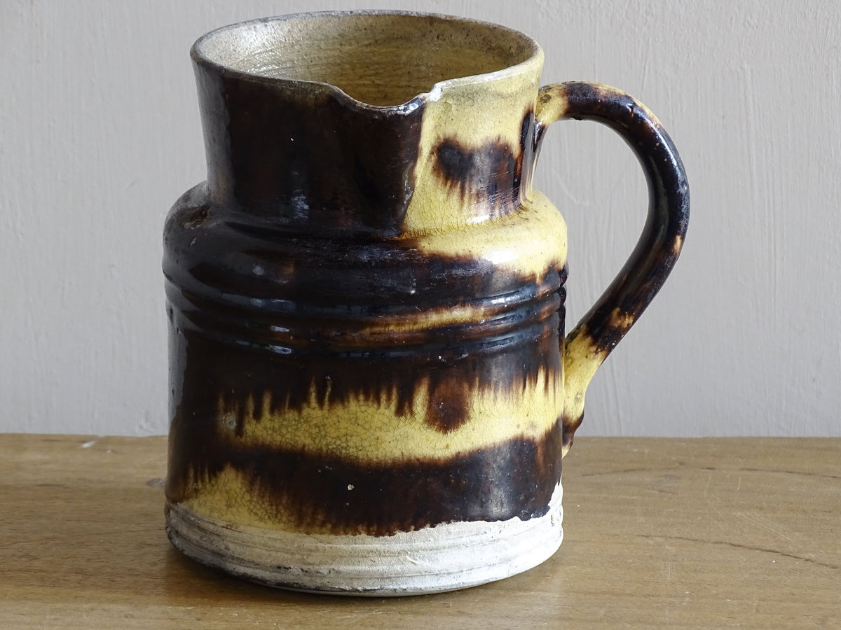French antique pottery pitcher from Dieulefit with yellow and brown glaze