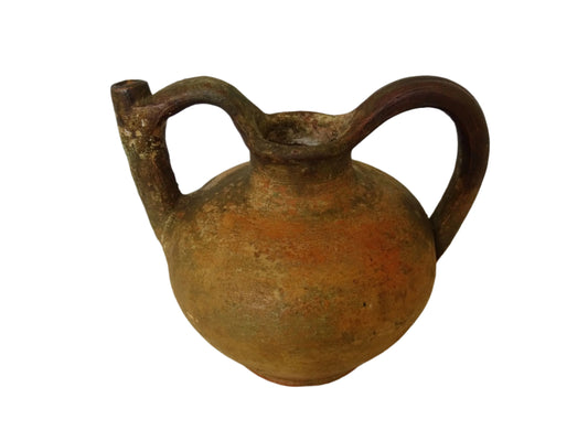 Small French antique terracotta pitcher or orjol with a beautiful patina. Rustic antique pottery water jug with two handles and a long spout.