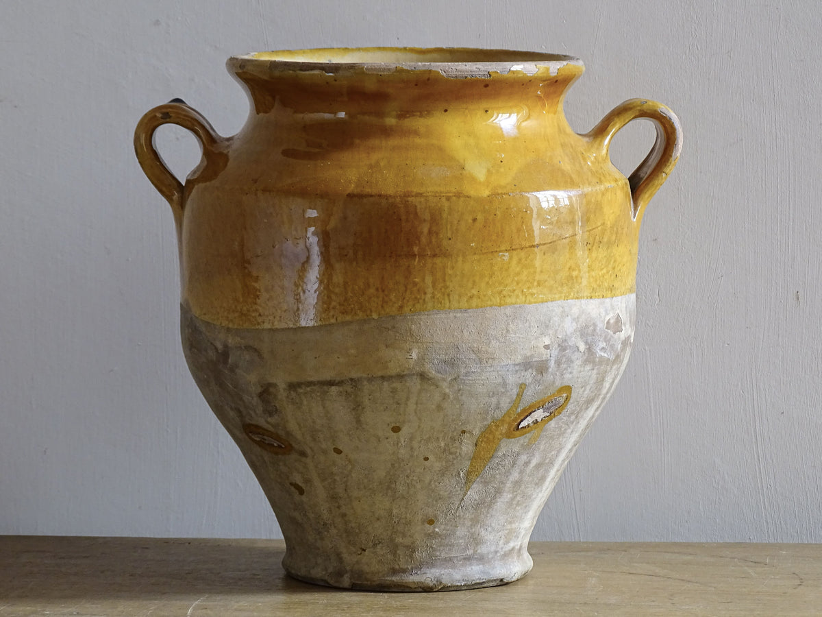 Antique French confit pot with yellow glaze for country house decor