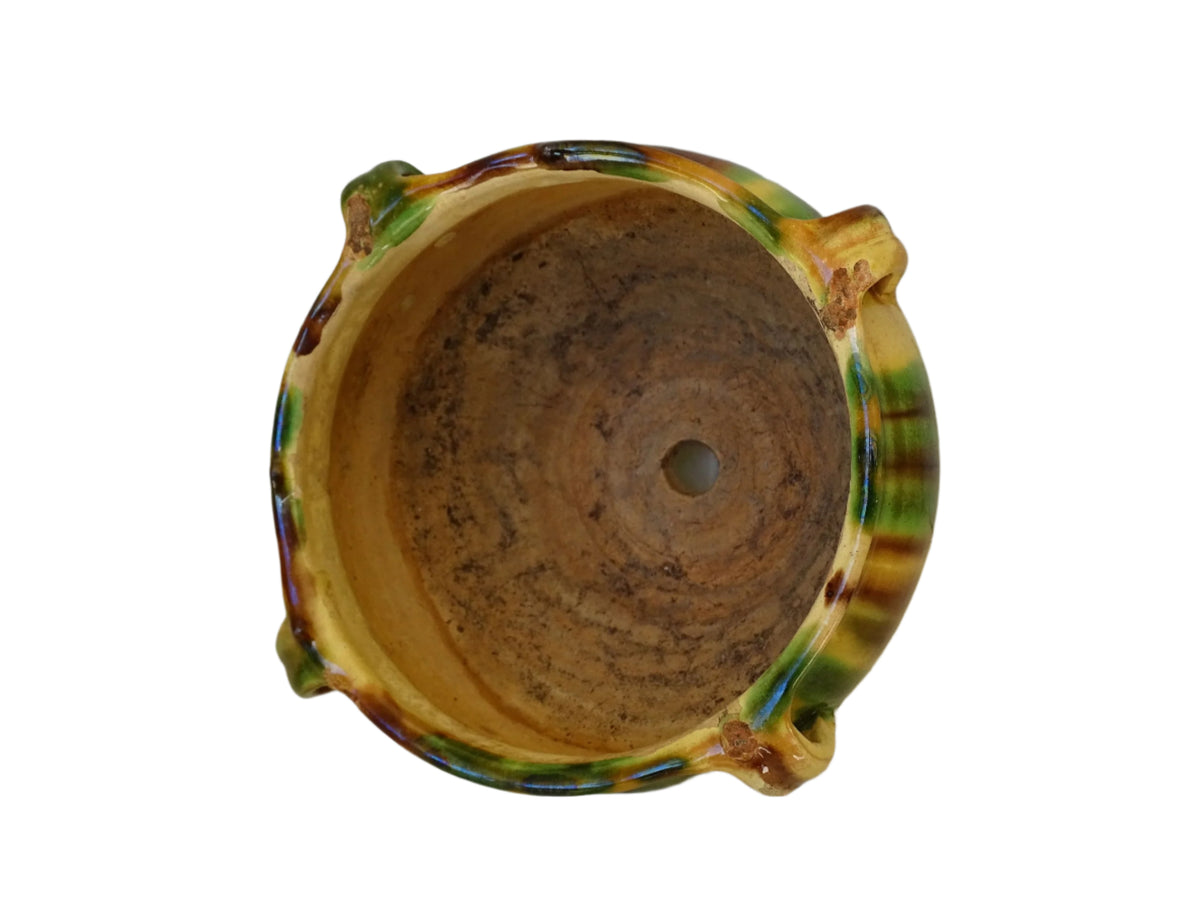 French antique ceramic planter with green, brown and yellow glaze.