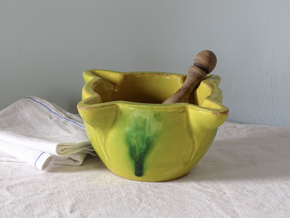 French vintage ceramic pestle and mortar with yellow and green glaze