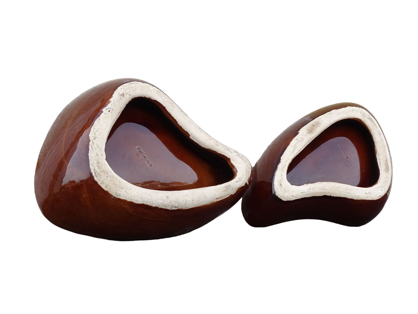 Pair of French vintage Vallauris ceramic dishes. Kidney shaped bowls with orange glaze with mid-century design.