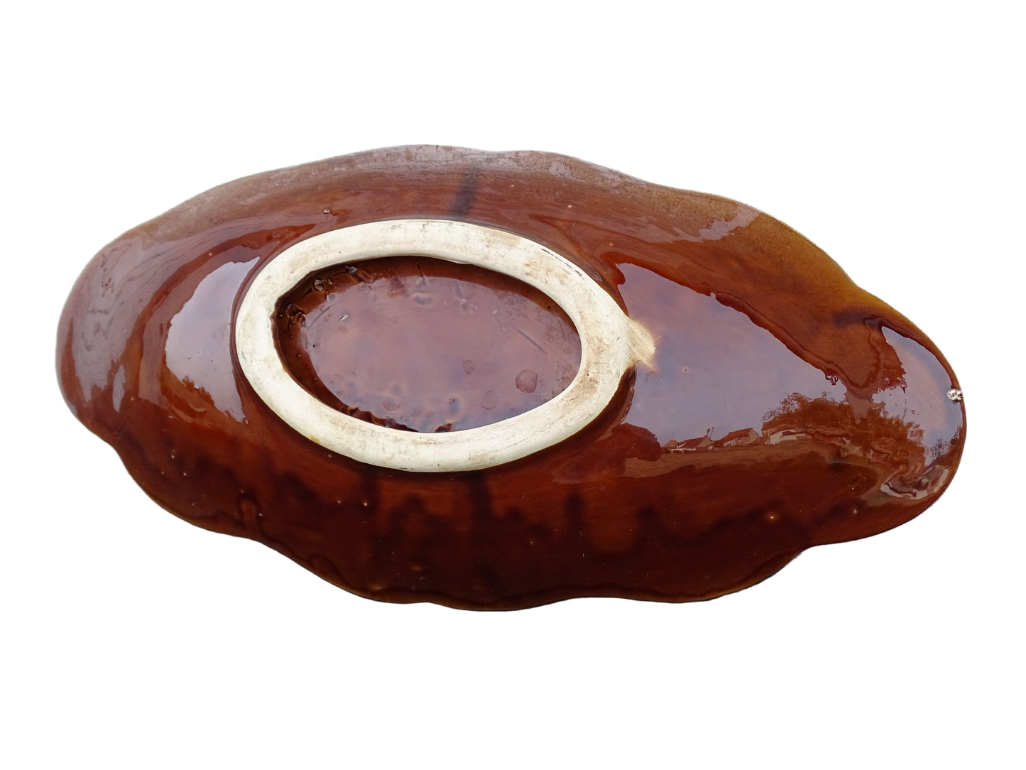 French vintage Vallauris pottery bowl with a brown glaze and red and green detailing. The ceramic centrepiece has a geometric design to the centre and a free flow design to the edge.