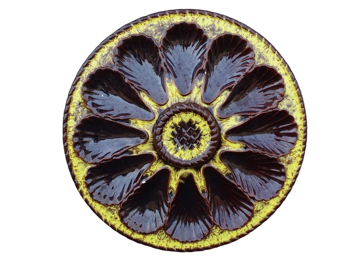 Large French vintage Vallauris ceramic oyster plate by Maruis Giuge. Serving platter with space for twelve oysters. It has a yellow and brown glaze.