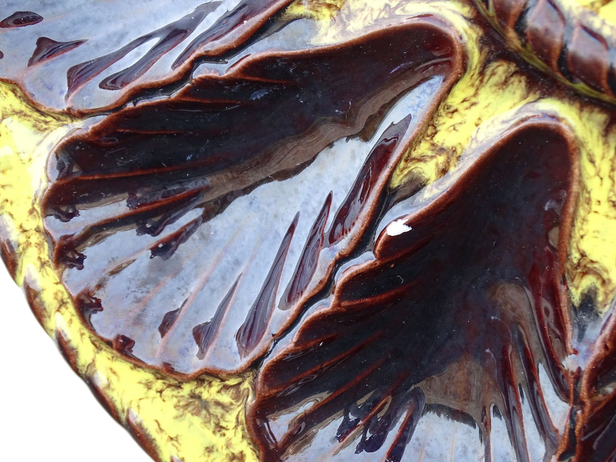 Large French vintage Vallauris ceramic oyster plate by Maruis Giuge. Serving platter with space for twelve oysters. It has a yellow and brown glaze.