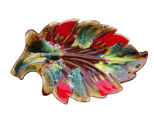 French vintage Vallauris ceramic bowl in a leaf design and glazed in brown and red with details in green, yellow and white.