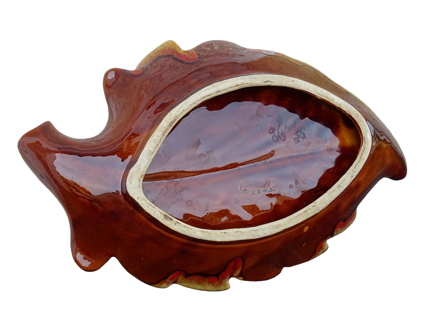 French vintage Vallauris ceramic bowl in a leaf design and glazed in brown and red with details in green, yellow and white.