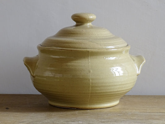 Vintage French pottery tureen with pale yellow glaze.