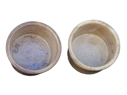 Timeworn French antique ceramic pots by Sarreguemines. 19th century rustic pottery confiture pots for a French country farmhouse display.