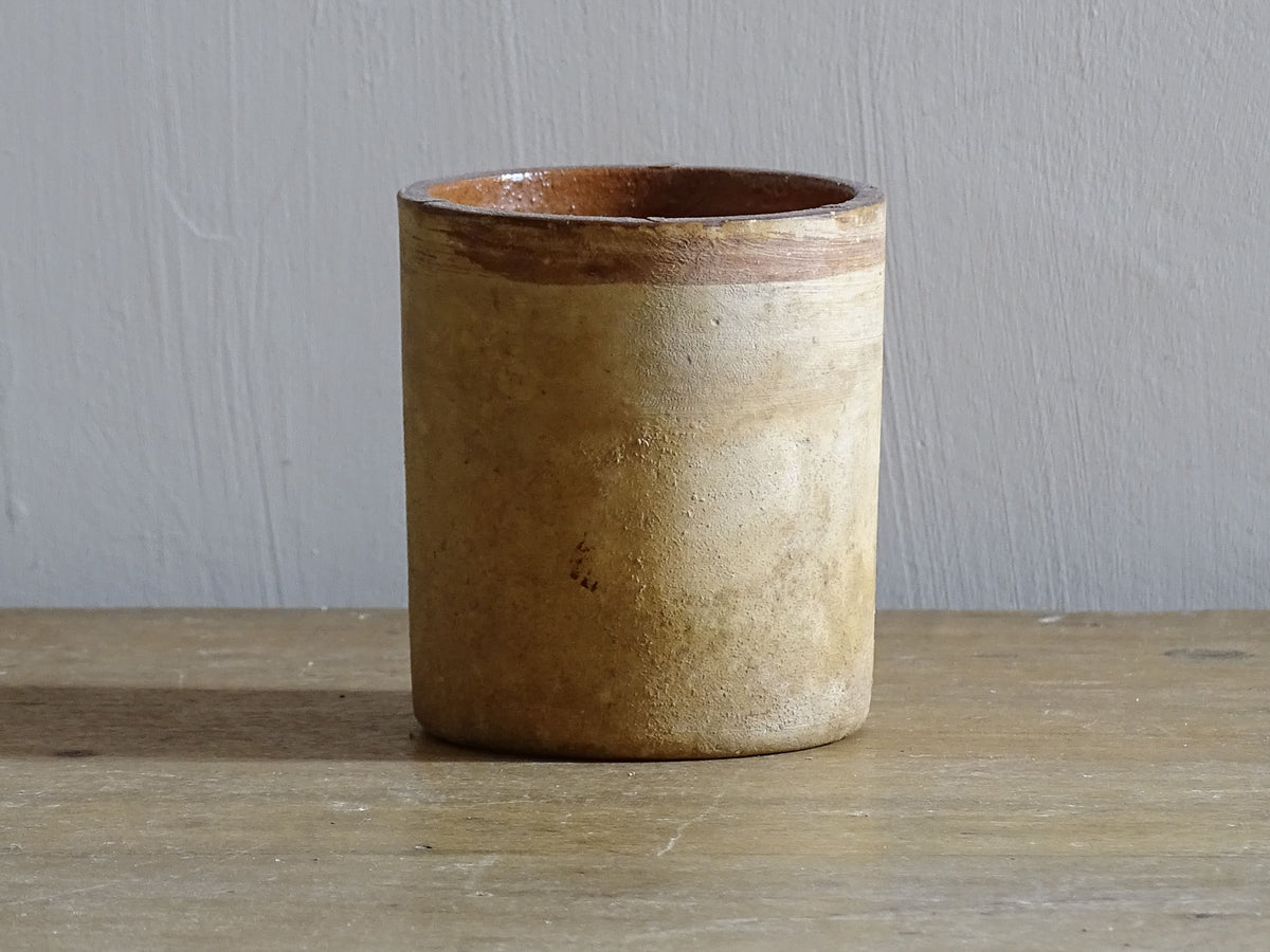Small French antique terracotta pot. Rustic pottery pot with a brown glaze interior.