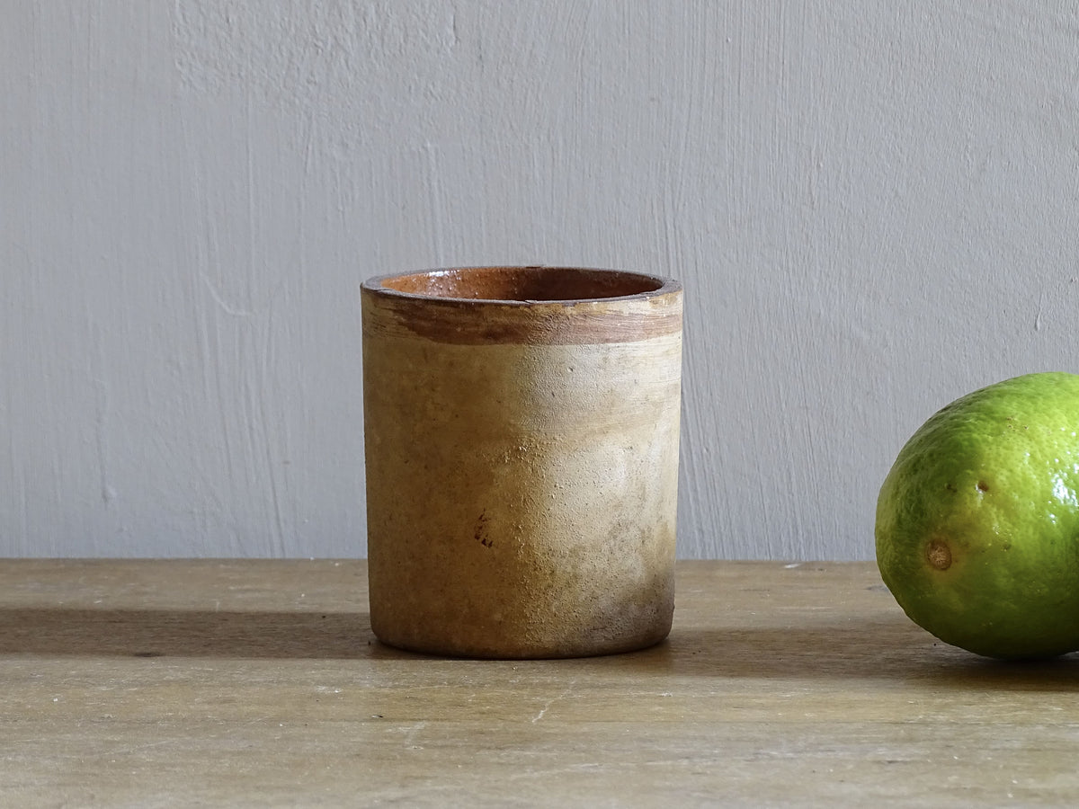 Small French antique terracotta pot. Rustic pottery pot with a brown glaze interior.