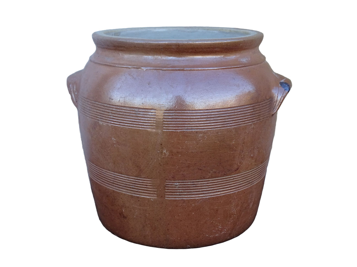 French antique ceramic jar with salt glaze. Brown confit pot with two handles and grey glaze interior.