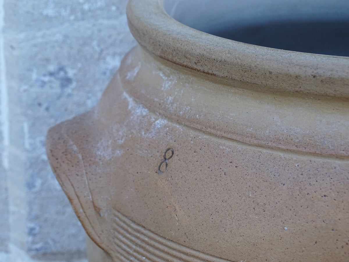 Large French antique stoneware jar with a brown glaze. This old confit pot has two handles.
