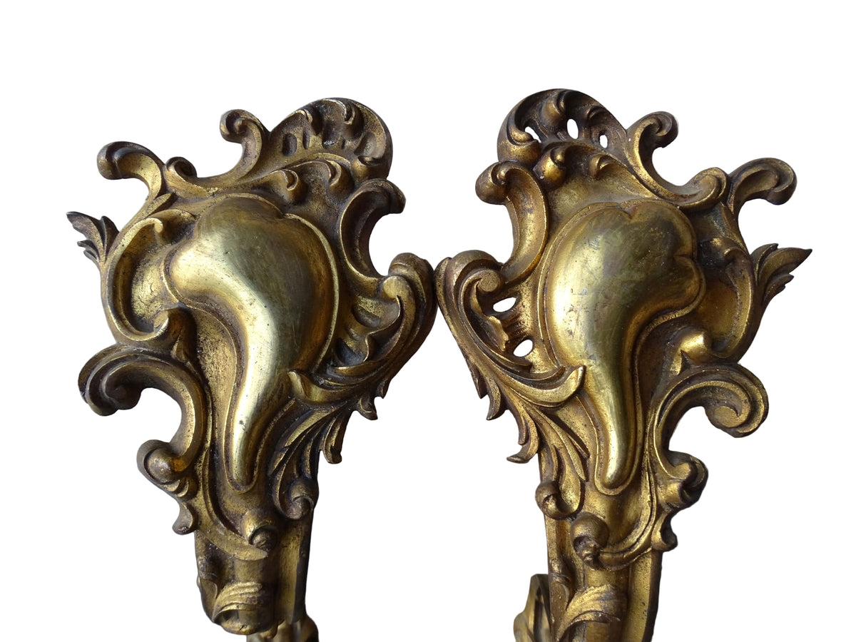 French antique ormolu curtain rod holders. Highly decorative gilt bronze curtain pole brackets.