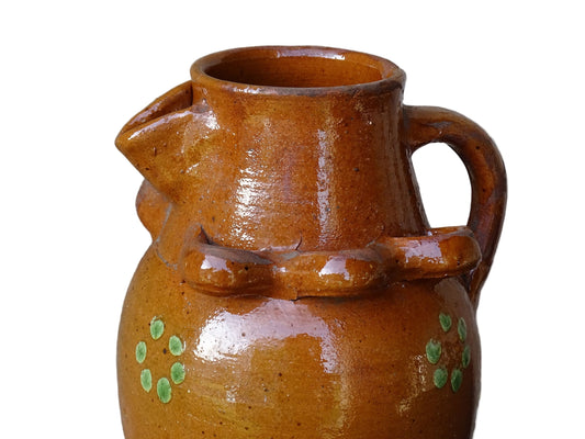 French antique terracotta pitcher from Savoie with orange glaze and yellow dots. Savoyard pottery jug with applied detailing.