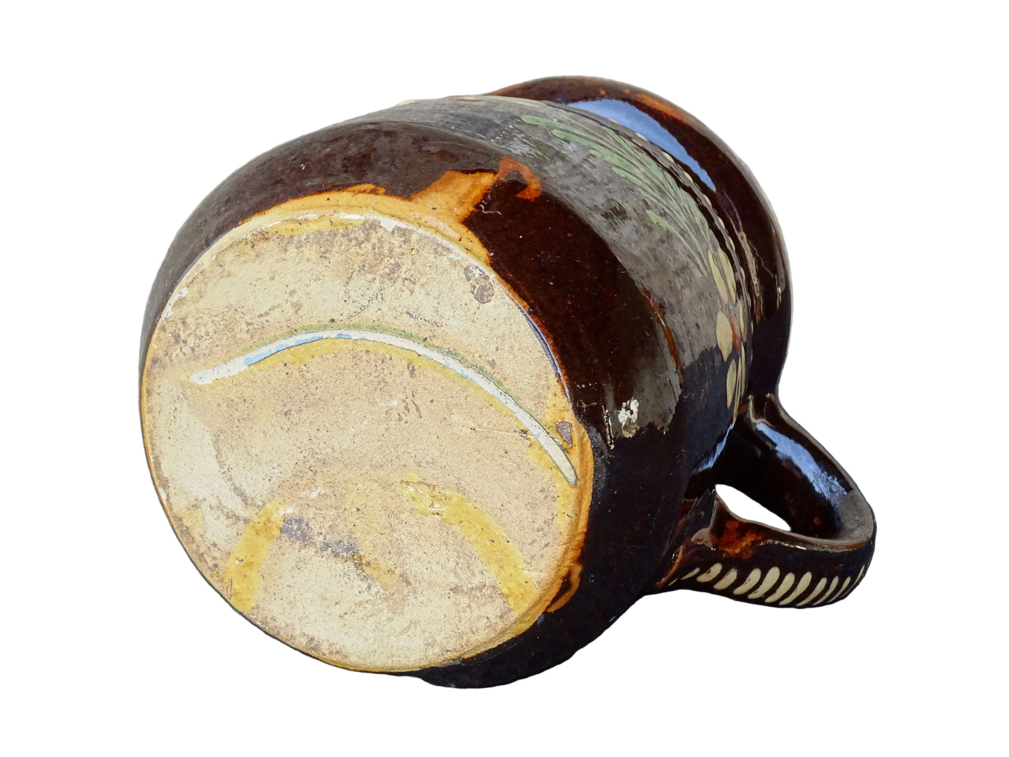 French vintage ceramic pitcher from Alsace. Pottery jug with brown glaze and hand painted with flowers, leaves and dots.