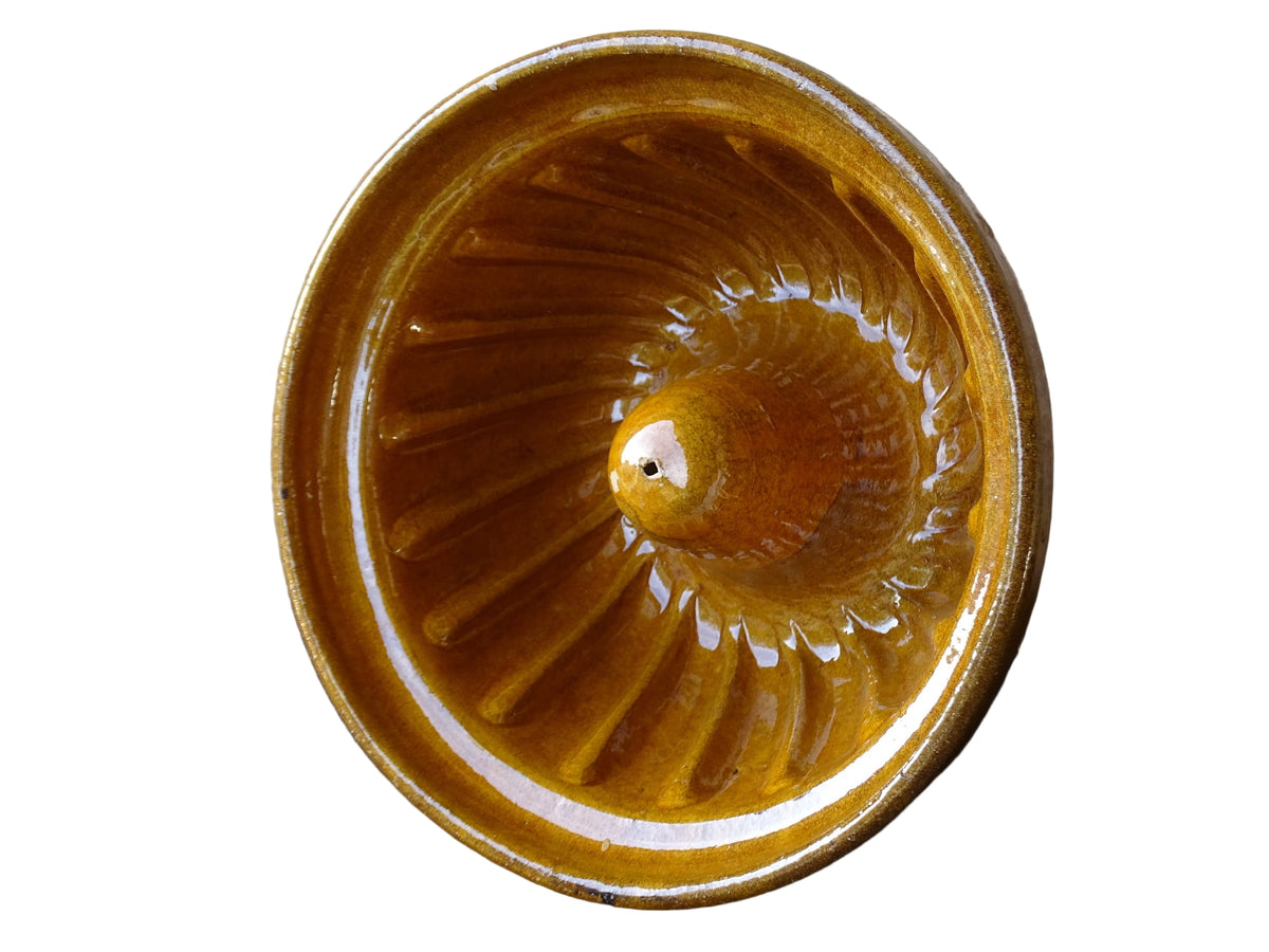 French vintage ceramic mould with a yellow glaze interior and unglazed exterior.