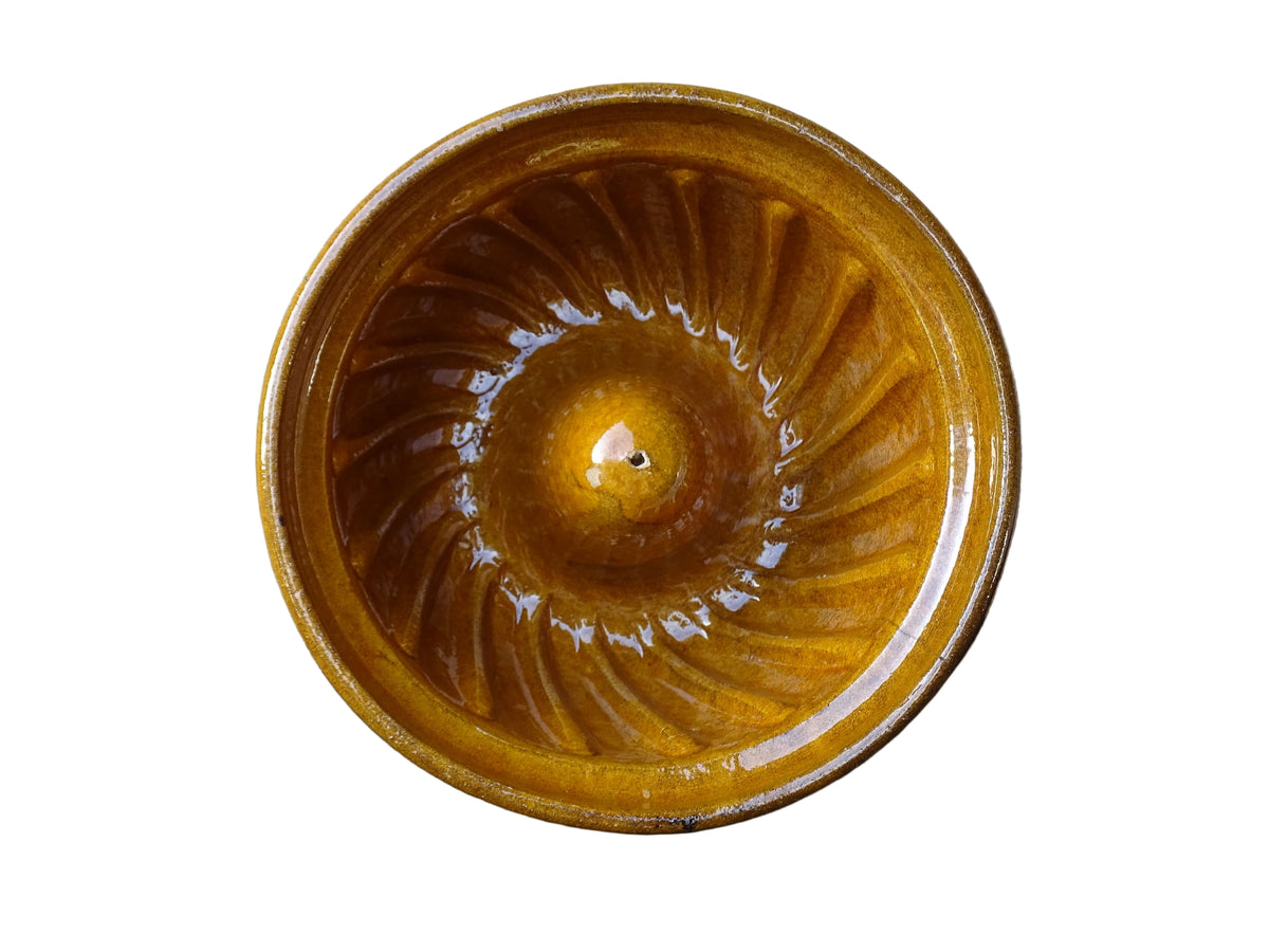 French vintage ceramic mould with a yellow glaze interior and unglazed exterior.